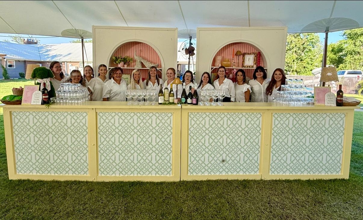Calm Your Soul outdoor wedding bar setup with staff